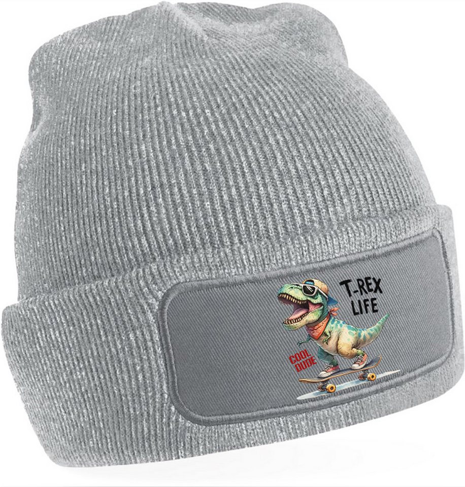 MyDesign24 Strickmütze für kalte Tage - Beanie mit Umschlag und Dino Skater Print Dino Skater Mütze Männer Frauen Jungen und Mädchen Wintermütze i532 von MyDesign24
