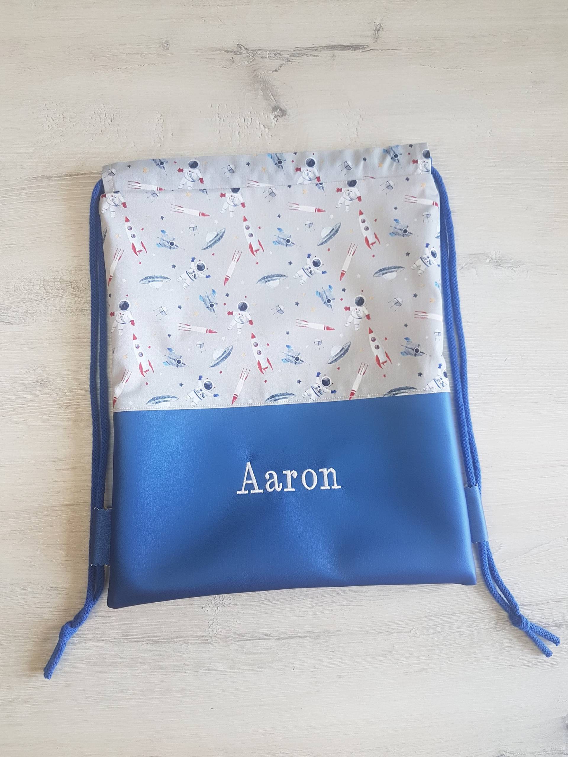 Turnbeutel Personalisiert Mit Namen/Kinderturnbeutel Kindergartenturnbeutel Sportbeutel Baumwolle Kunstleder Astronaut Rakete Turnbeutel Personalisiert Mit Namen/Kinderturnbeutel Kindergartenturnbeutel Sportbeutel Baumwolle Kunstleder Astronaut Rakete von MyMarelle