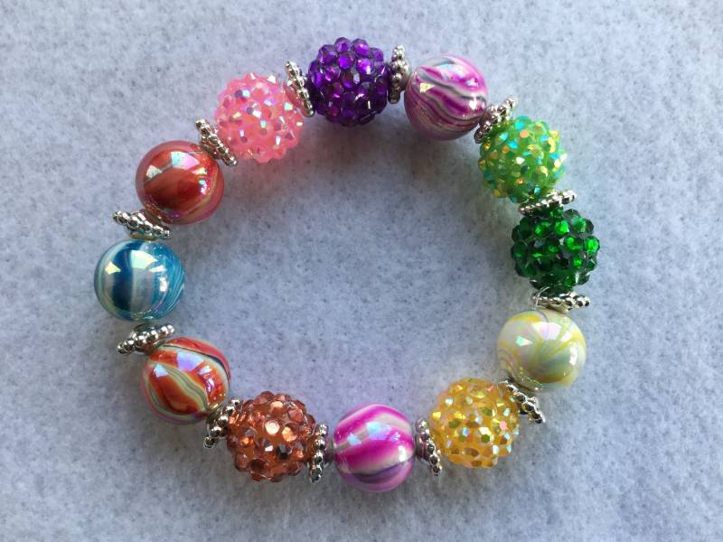 Karneval Farben Stretch Armband von MysticMerchantGifts