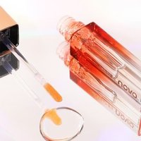 NOVO - Luminous Plumping Color Changing Lip Oil - 2 Colors 02# Tangerine Milk Tea - 3g NOVO - Luminous Plumping Color Changing Lip Oil - 2 Colors 02# Tangerine Milk Tea - 3g von NOVO