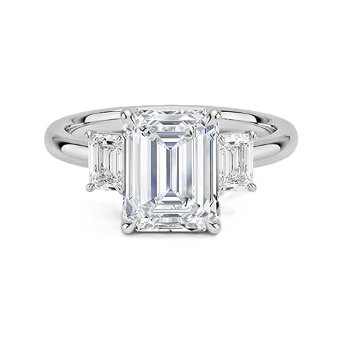 Moissanit Ring mit drei Steinen im Smaragdschliff 9x7mm | Sterling Silber 925 mit Rhodiumbeschichtung | Wunderschöner Moissanit Verlobungsring mit drei Steinen. (61) von NYZA JEWELS