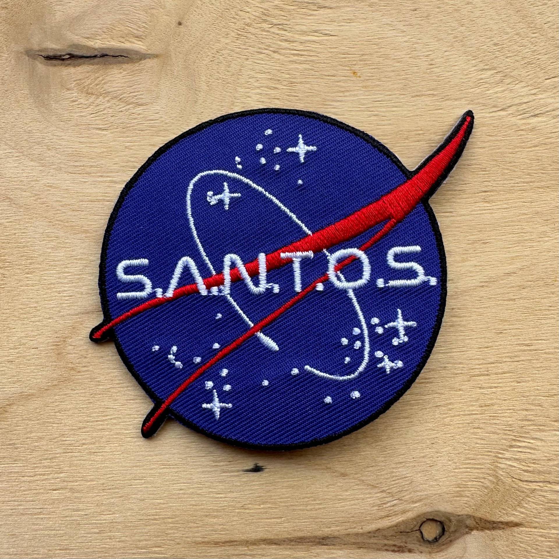 Santos Bügelbild Santos Bügelbild von NeedleRockThreads