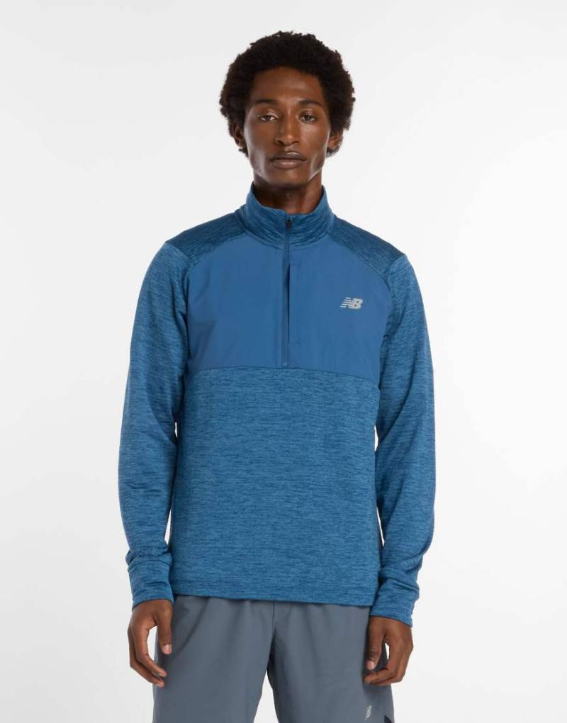 New Balance - Athletics Heat Grid - Sweatshirt in Blau mit halblangem Reißverschluss New Balance - Athletics Heat Grid - Sweatshirt in Blau mit halblangem Reißverschluss von New Balance