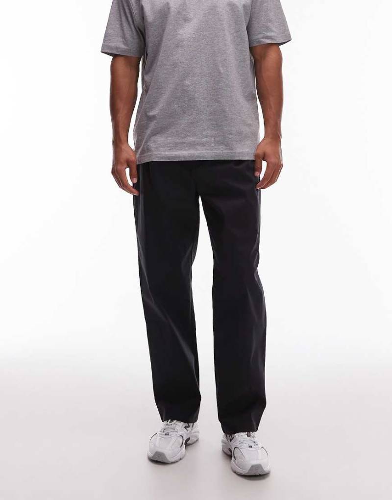 New Balance - Athletics - Lässige Hose in Schwarz von New Balance