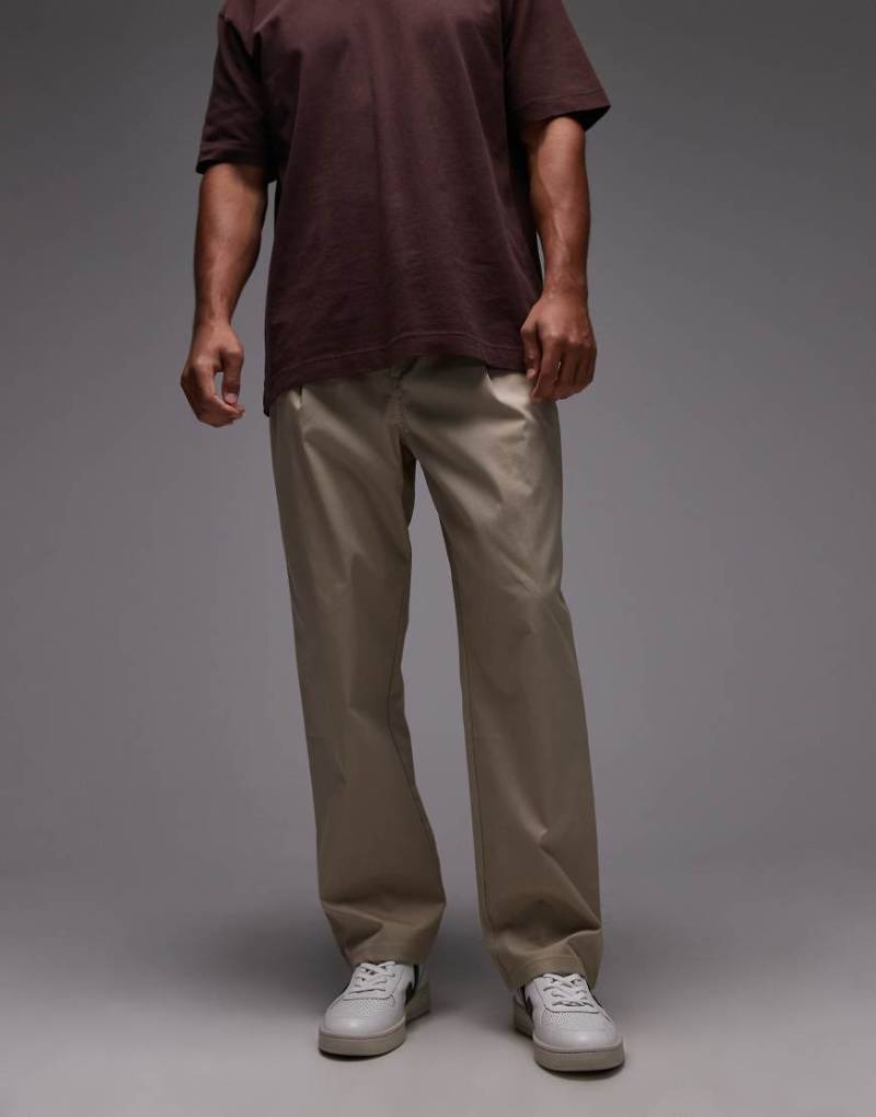 New Balance - Athletics - Locker geschnittene Hose in Beige-Grau von New Balance