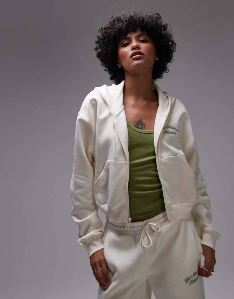 New Balance - Fleece-Kapuzenjacke in Beige mit durchgehendem Reißverschluss-Neutral von New Balance