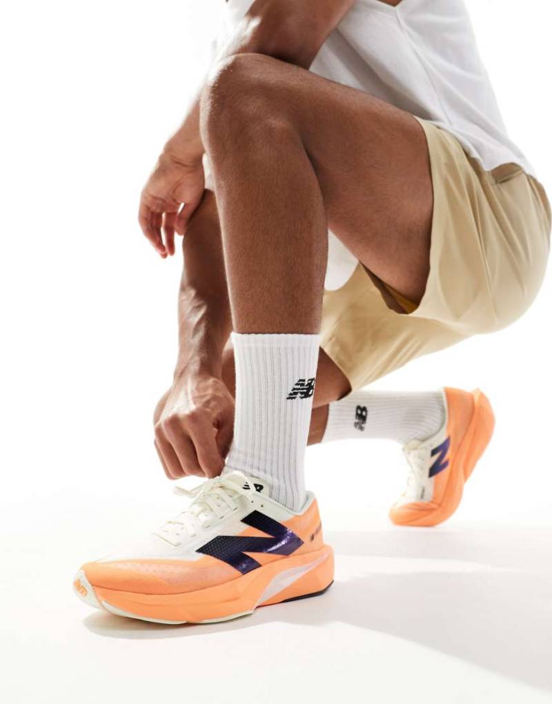 New Balance - FuelCell Rebel V4 - Laufschuhe in Orange von New Balance