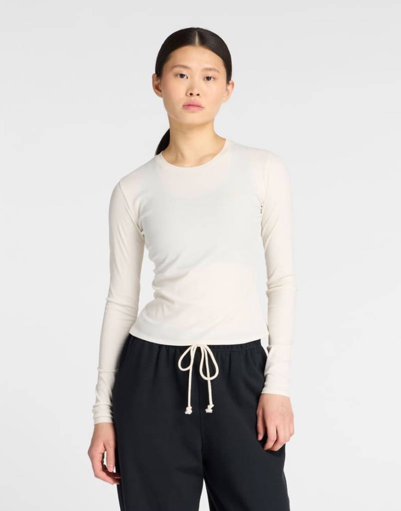 New Balance - Langärmliges, fein geripptes T-Shirt in Weiß von New Balance