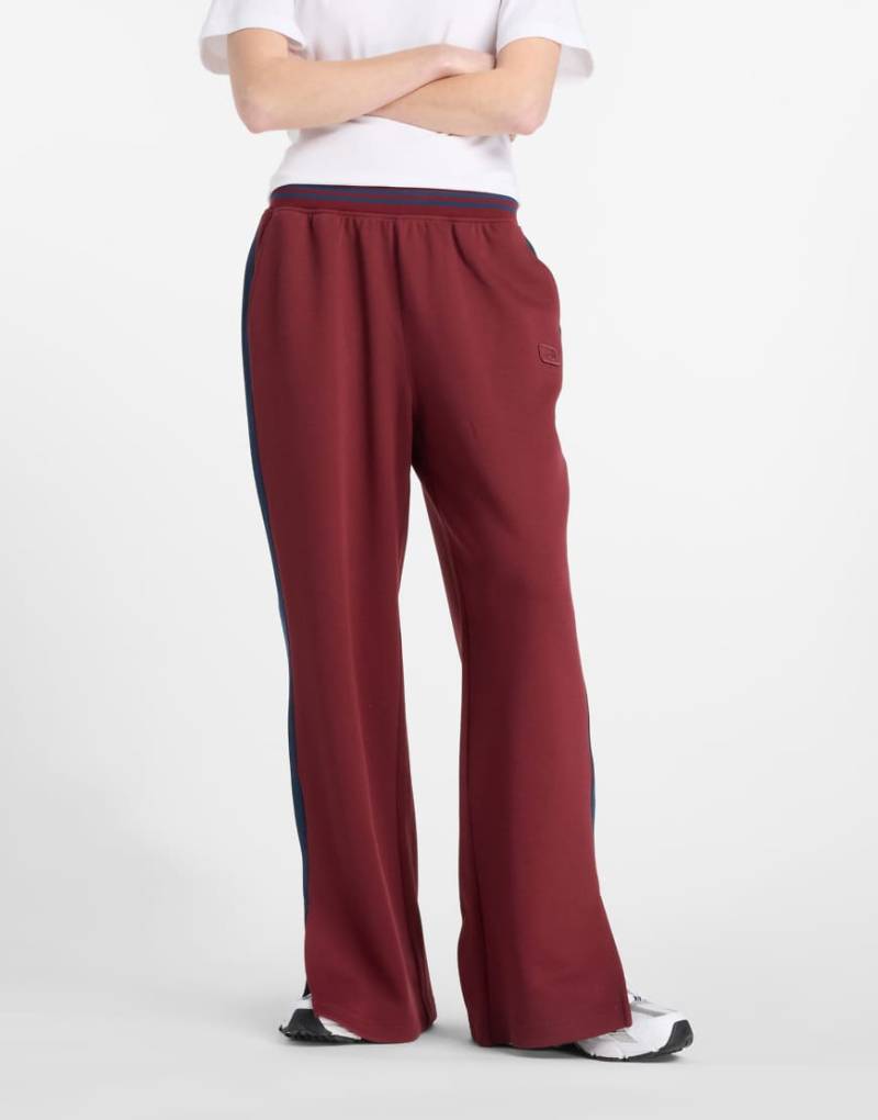 New Balance - Post Season - Pikee-Trainingshose in Rot New Balance - Post Season - Pikee-Trainingshose in Rot von New Balance