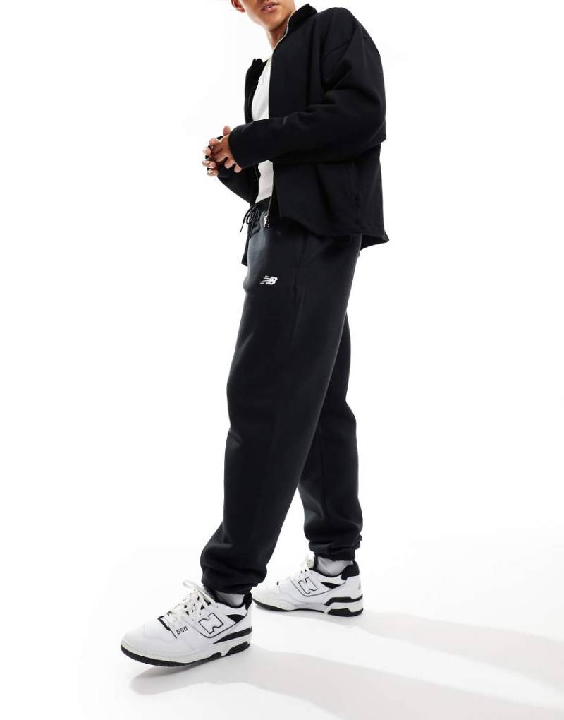 New Balance - Sport Essentials - Jogginghose aus schwarzem Fleece von New Balance