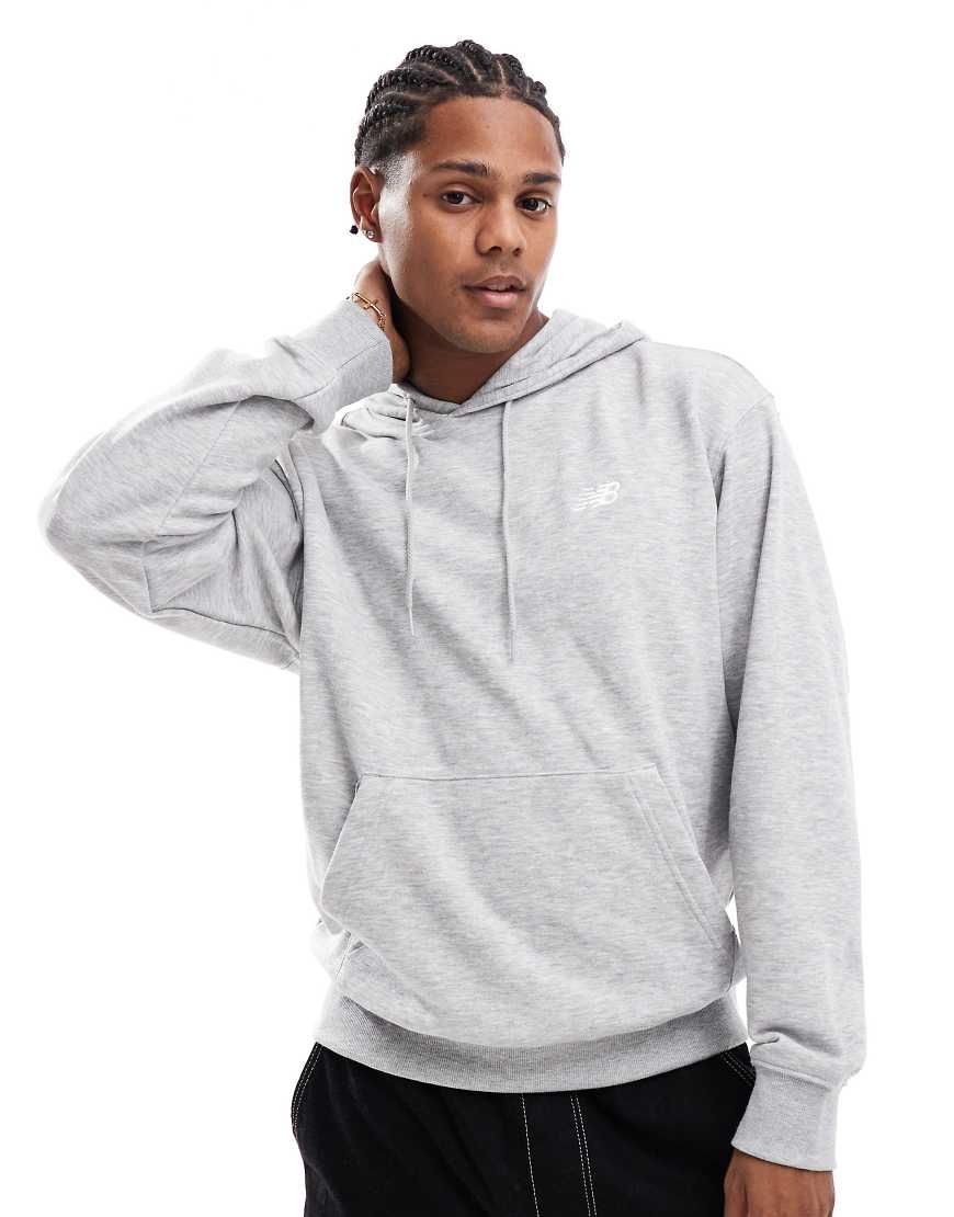 New Balance - Sport Essentials - Kapuzenpullover aus Frottee in Grau von New Balance