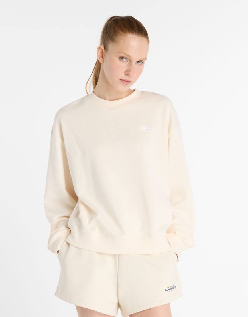 New Balance - Sport Essentials - Pullover aus French-Terry in Permafrost mit Rundhalsausschnitt-Weiß von New Balance