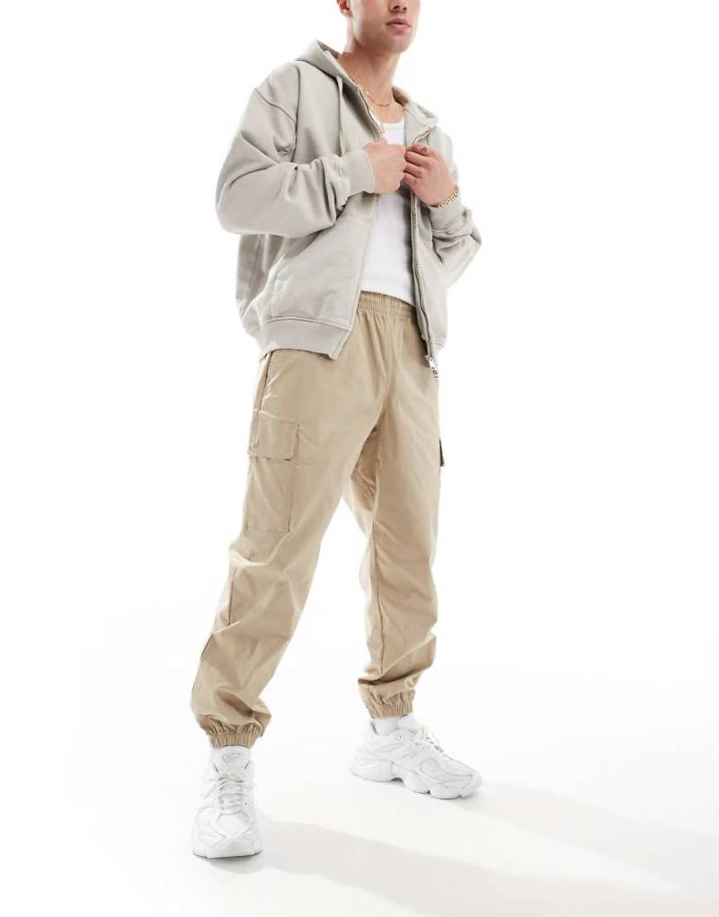 New Balance - Vip - Cargo-Jogginghose aus Twill in Beige-Neutral von New Balance