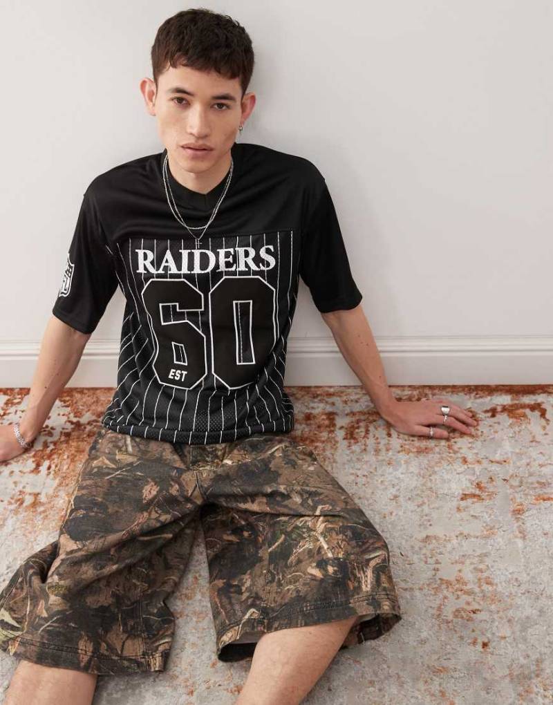 New Era - Las Vegas Raiders - Sport-Oberteil in gestreiftem Schwarz mit Motiv von New Era