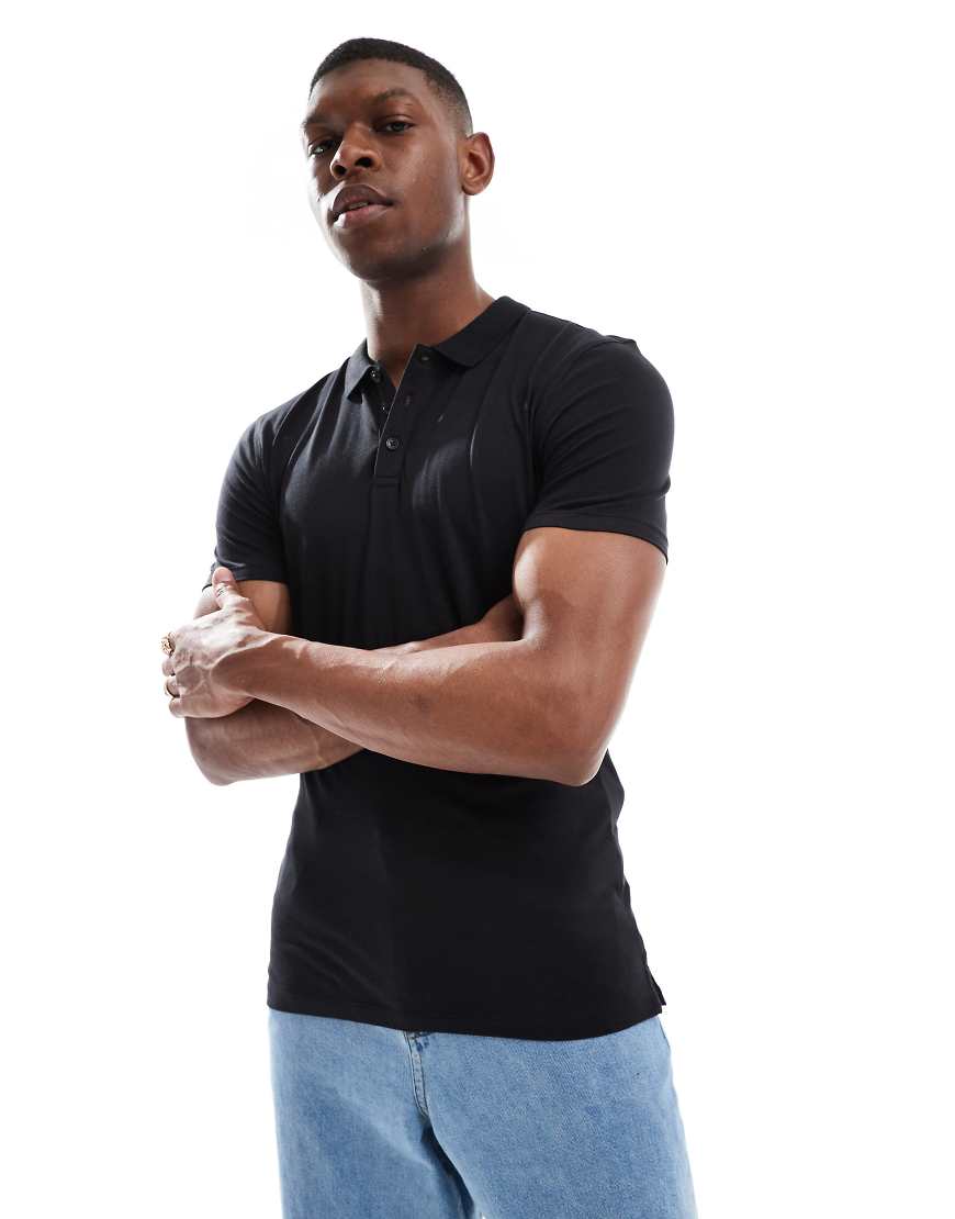 New Look - Einfarbiges Muskel-Poloshirt in Schwarz New Look - Einfarbiges Muskel-Poloshirt in Schwarz von New Look