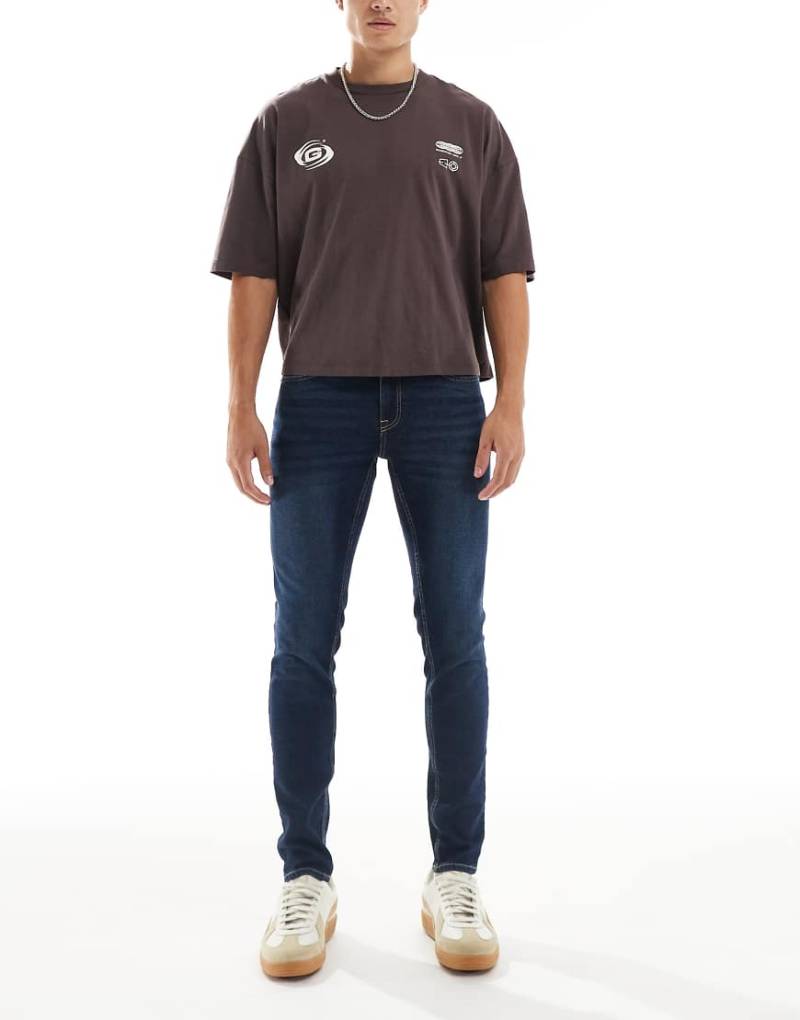 New Look - Eng geschnittene Jeans in Indigoblau-Marineblau von New Look