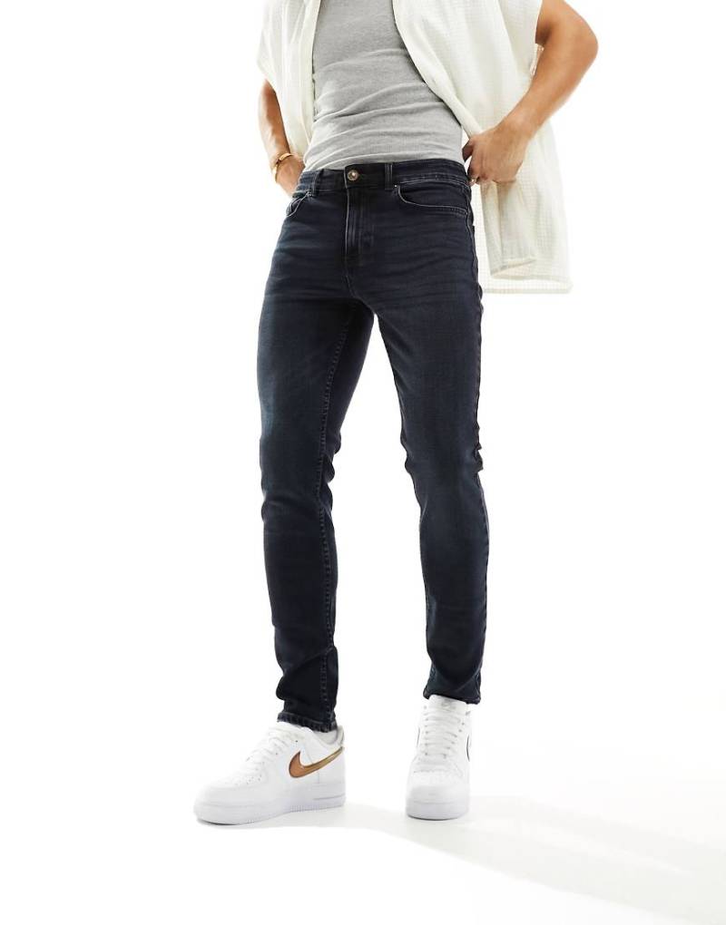 New Look - Eng geschnittene Jeans in dunkler indigoblauer Waschung von New Look
