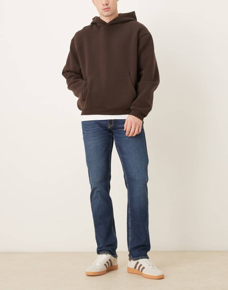 New Look - Schmal geschnittene Jeans in verwaschenem Indigoblau-Marineblau von New Look