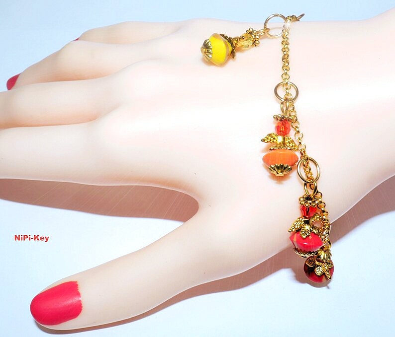 Traumhaft Schöne Zarte Engelchen Mit Glitzernden Swarovski Perlen, Regenbogenfarben Unikat Handarbeit Regenbogenengelchen Aus Polymerton von NiPiKey