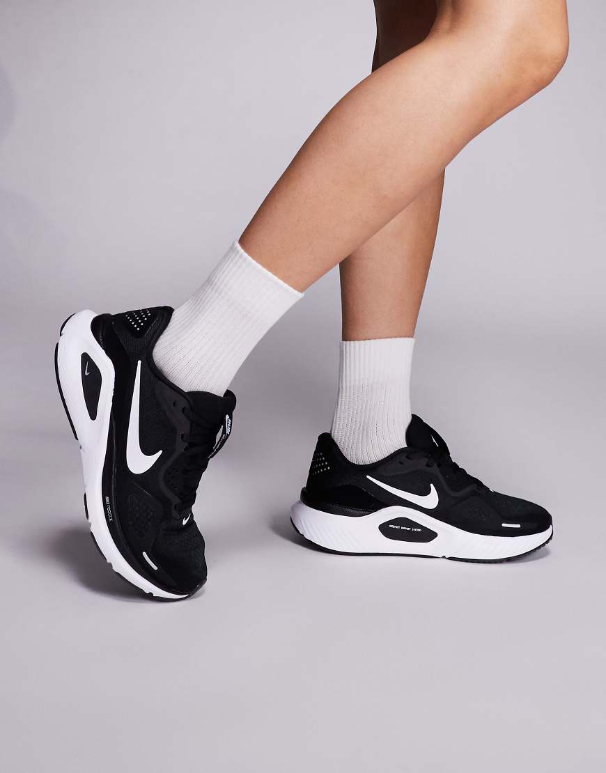 Nike Running - Structure 26 - Sneaker in Schwarz und Weiß Nike Running - Structure 26 - Sneaker in Schwarz und Weiß von Nike Running