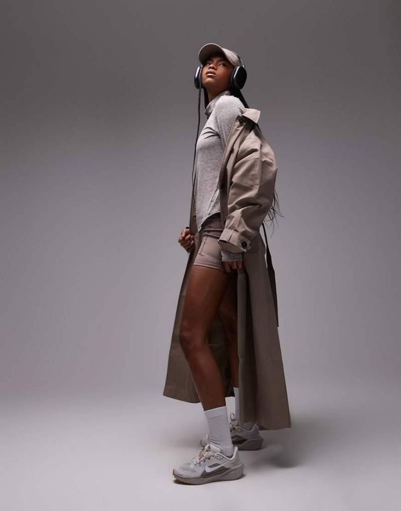 Nike Running - Swift Dri-FIT - Kurze Lauf-Leggings in Braun mit hohem Bund, 4 Zoll Schrittlänge von Nike Running