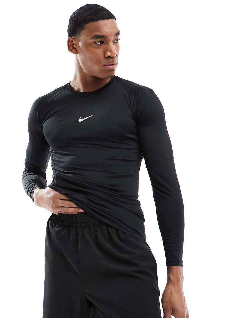 Nike - Pro Training - Langärmliges, körperbetontes T-Shirt in Schwarz von Nike Training