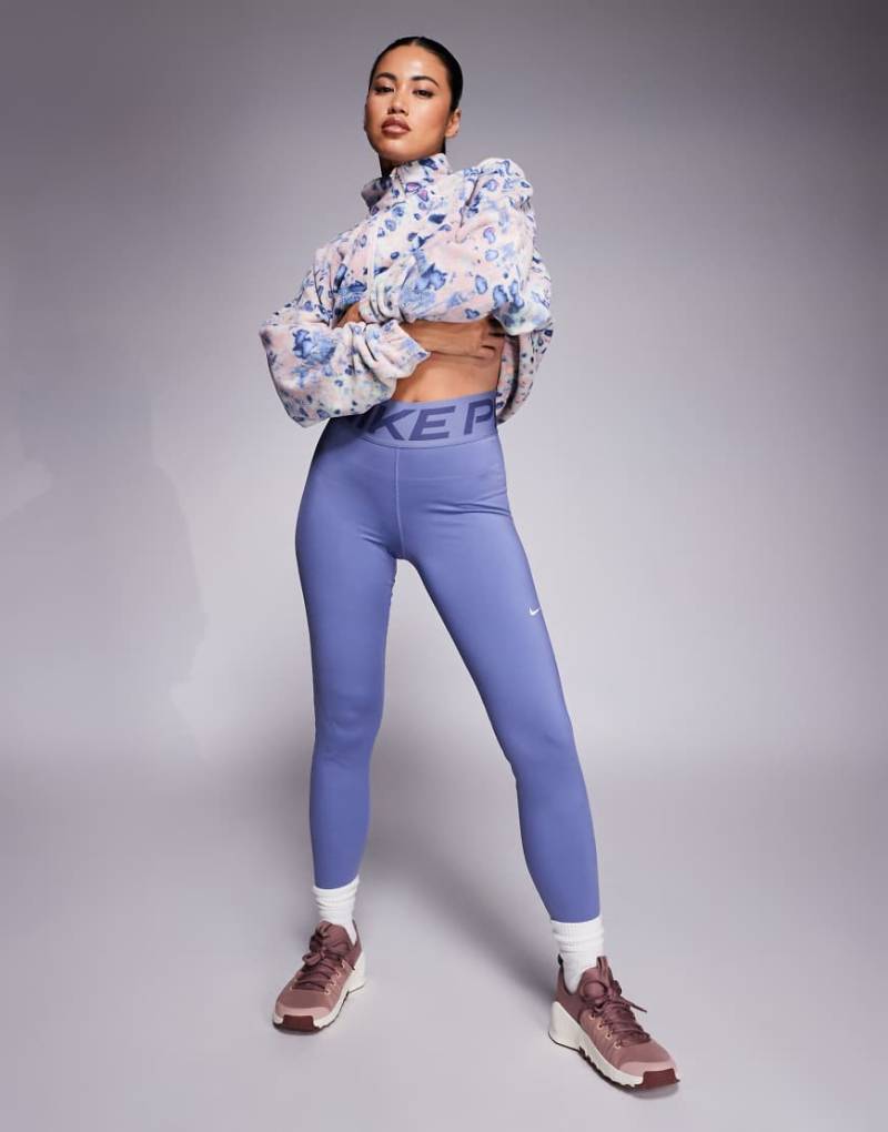 Nike - Pro Training - Formende Leggings in Blau mit hohem Bund Nike - Pro Training - Formende Leggings in Blau mit hohem Bund von Nike Training