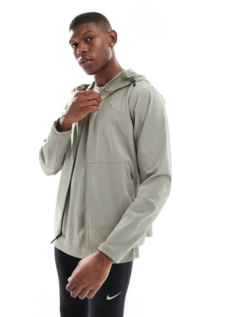 Nike Training - Dri-FIT - Jacke in hellem Khaki-Grün von Nike Training