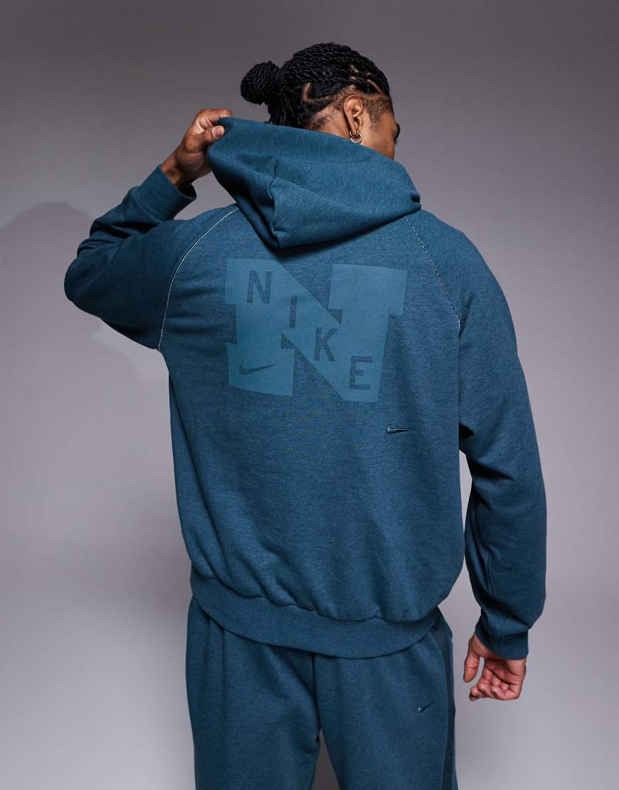Nike Training - Heritage Dri-FIT - Kapuzenpullover in Blau-Grün von Nike Training
