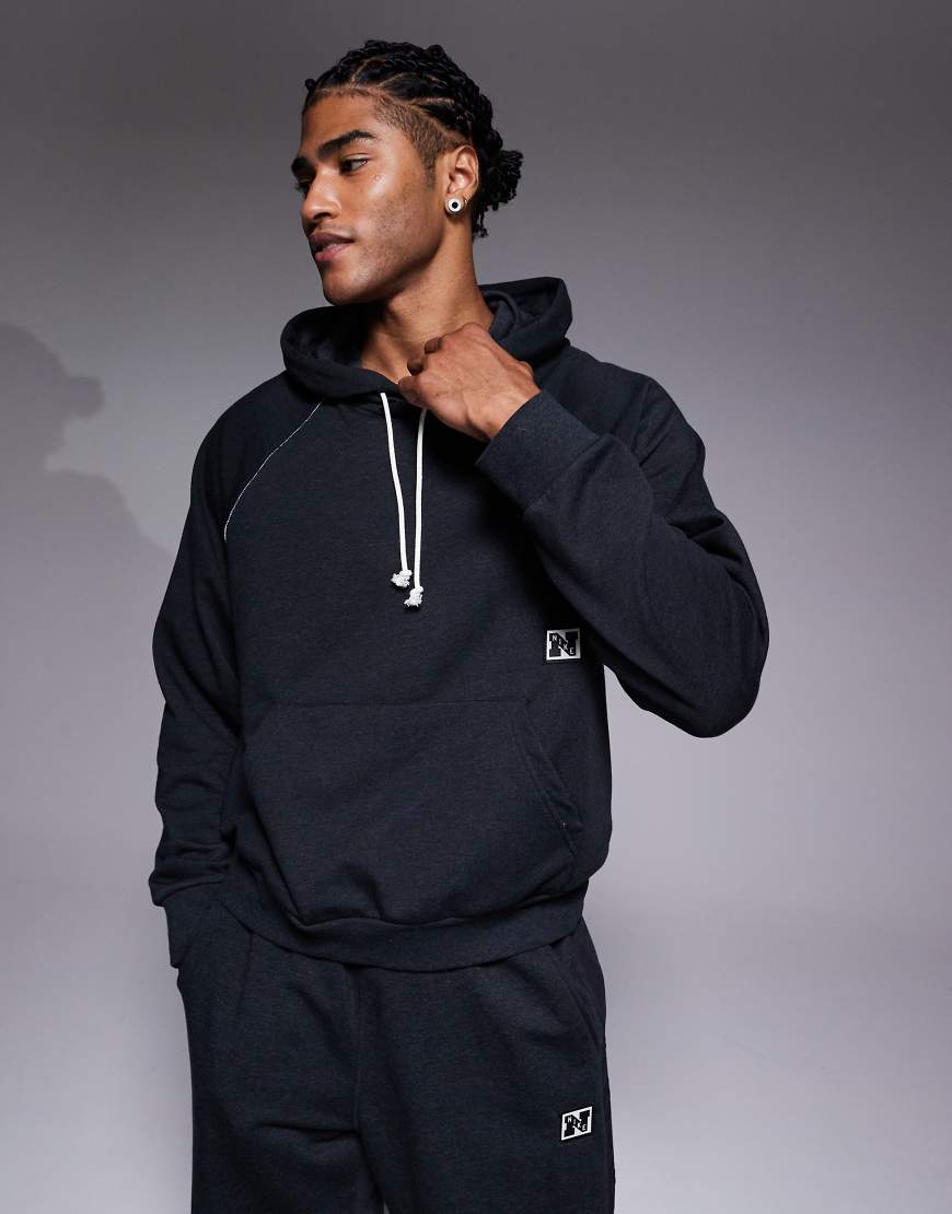 Nike Training - Heritage Dri-FIT - Kapuzenpullover in Schwarz Nike Training - Heritage Dri-FIT - Kapuzenpullover in Schwarz von Nike Training