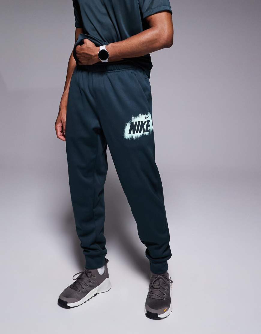 Nike Training - Heritage - Jogginghose in Grün-Schwarz Nike Training - Heritage - Jogginghose in Grün-Schwarz von Nike Training