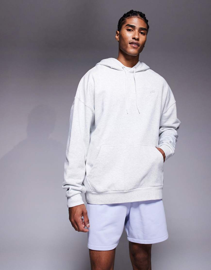 Nike Club - Oversize-Kapuzenpullover aus French Terry in Grau meliert Nike Club - Oversize-Kapuzenpullover aus French Terry in Grau meliert von Nike
