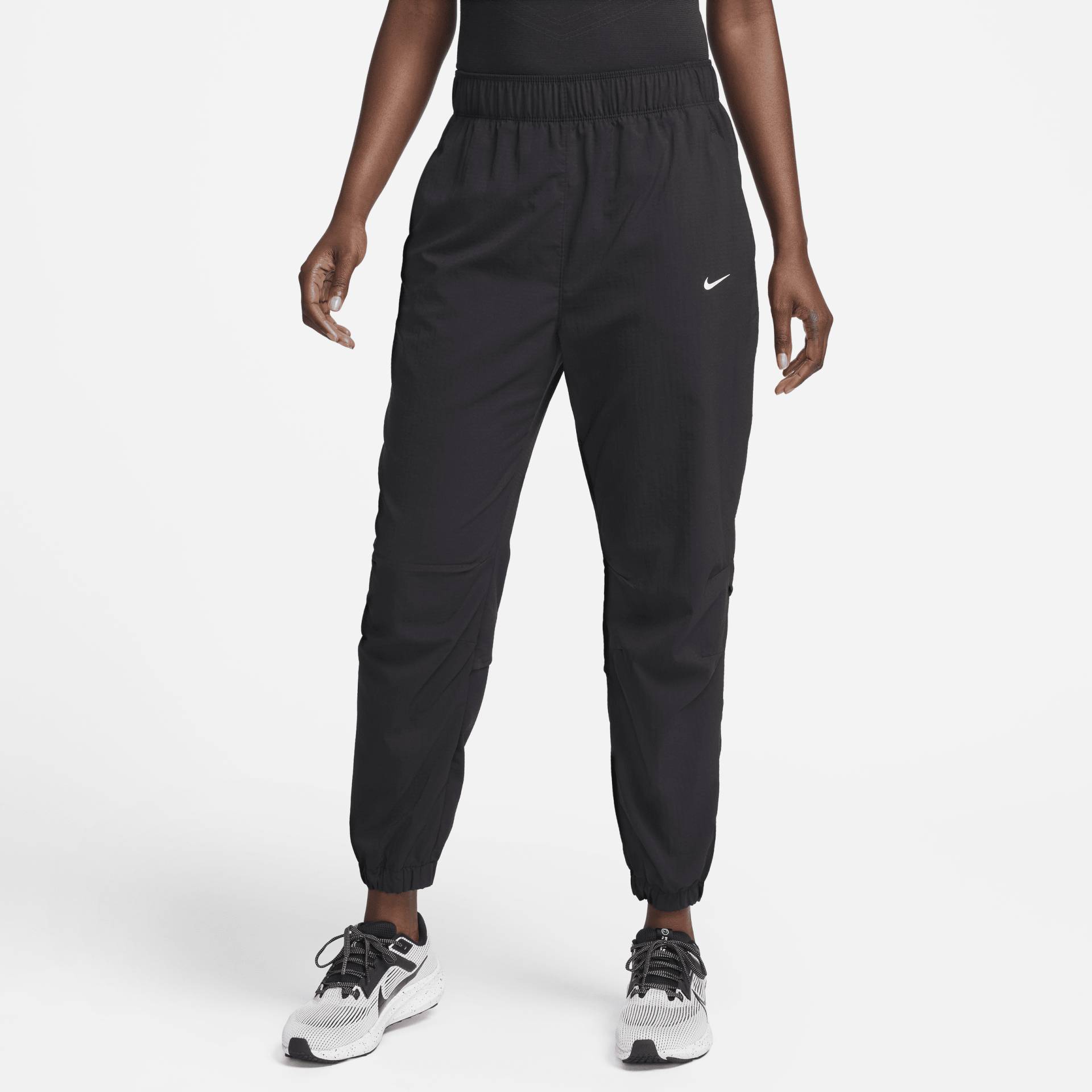 Nike Dri-FIT Fast Warm-up-Laufhose in 7/8-Länge mit mittelhohem Bund für Damen - Schwarz von Nike