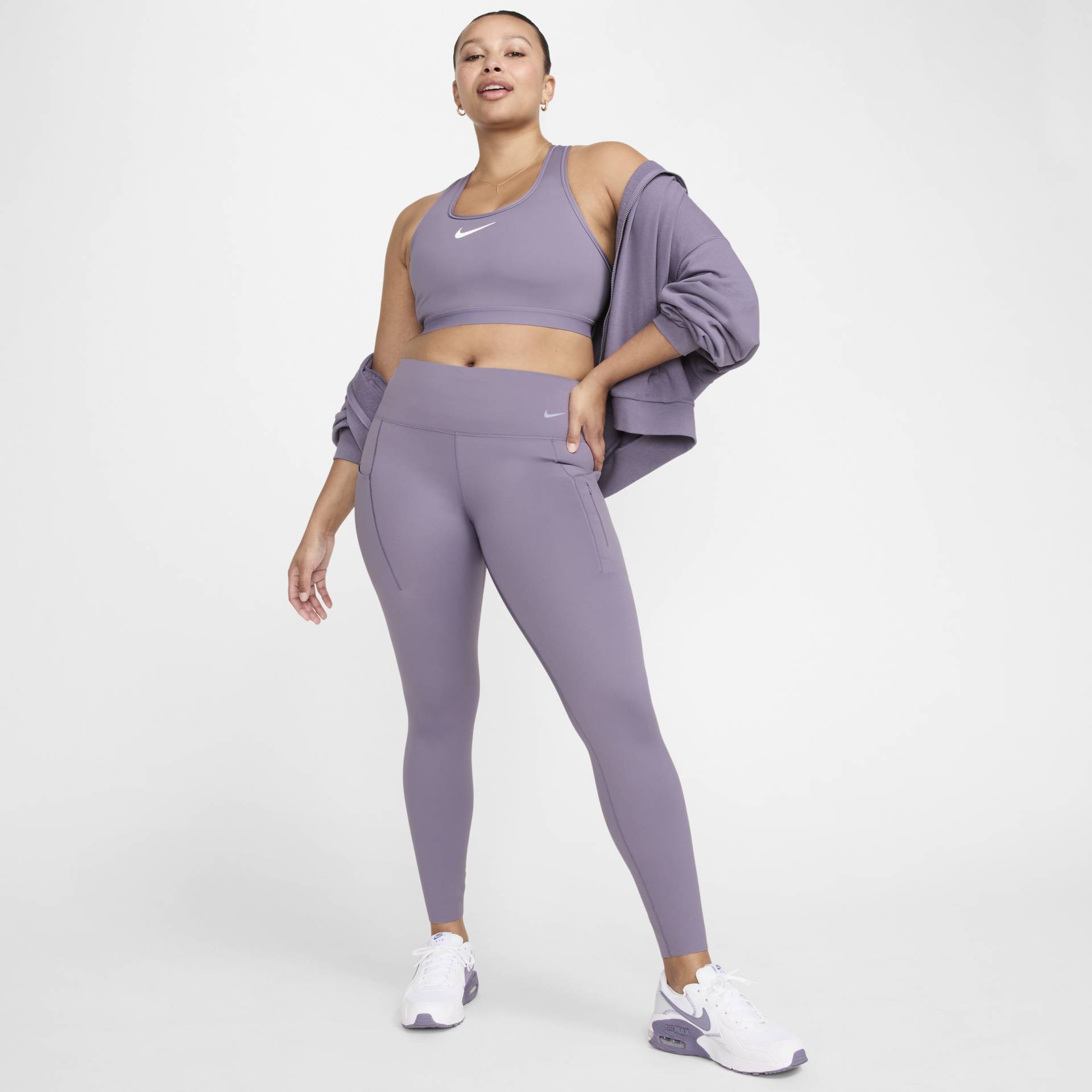 Nike Go Leggings in voller Länge mit starkem Halt, mittelhohem Bund und Taschen für Damen - Lila von Nike