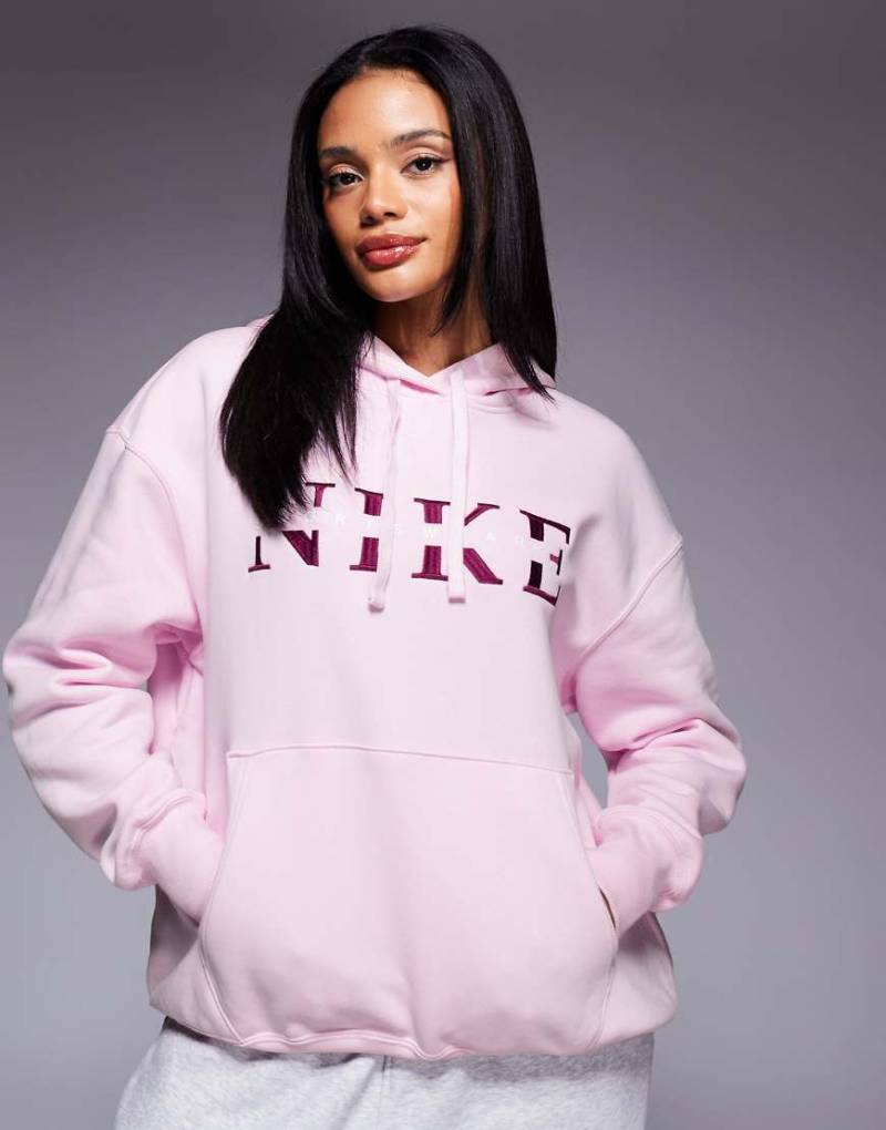 Nike - Gym Life Swoosh - Oversize-Kapuzenpullover in Rosa mit Grafik von Nike