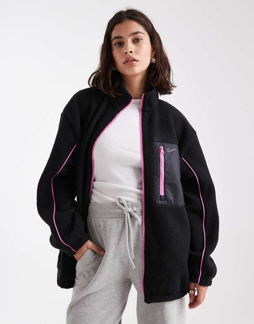 Nike - Jacke aus Teddyfleece in Schwarz und Rosa Nike - Jacke aus Teddyfleece in Schwarz und Rosa von Nike