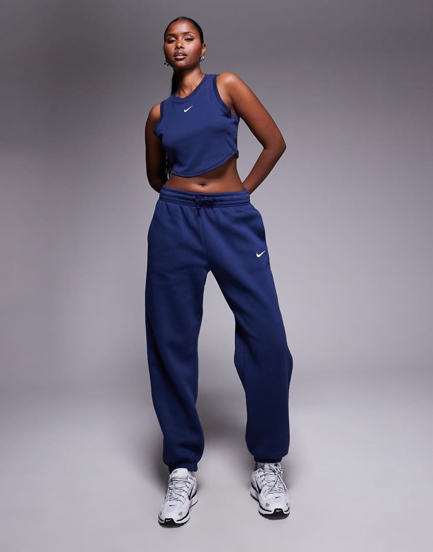 Nike - Phoenix Fleece - Oversize-Jogginghose in Marineblau mit hohem Bund und Bündchen von Nike