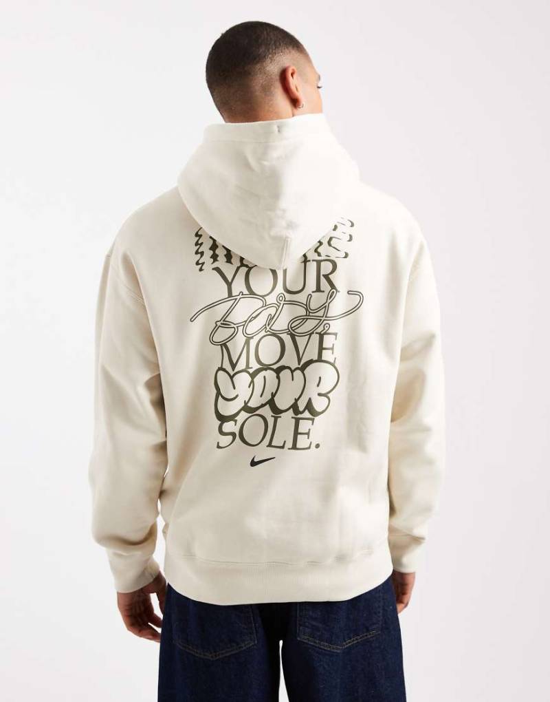 Nike - Solo Swoosh - Kapuzenpullover in Beige mit Grafikmotiv und Swoosh-Logo-Neutral von Nike