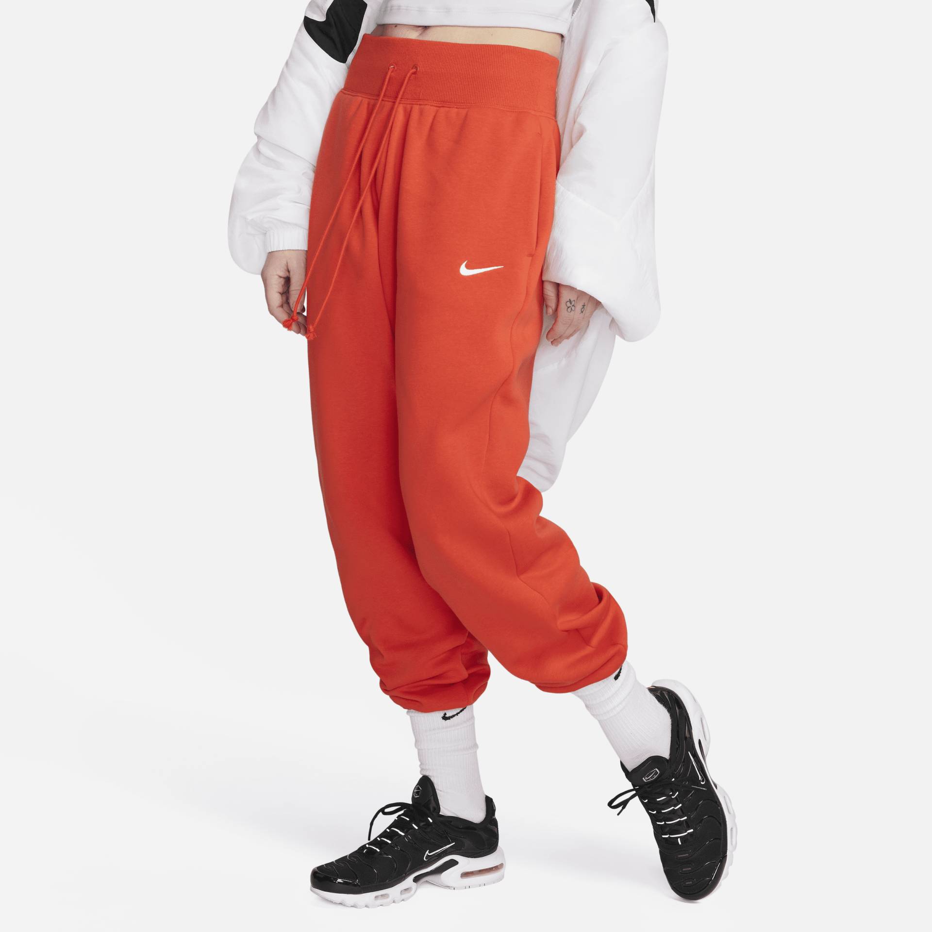 Nike Sportswear Phoenix Fleece Oversize-Trainingshose mit hohem Taillenbund für Damen - Rot von Nike