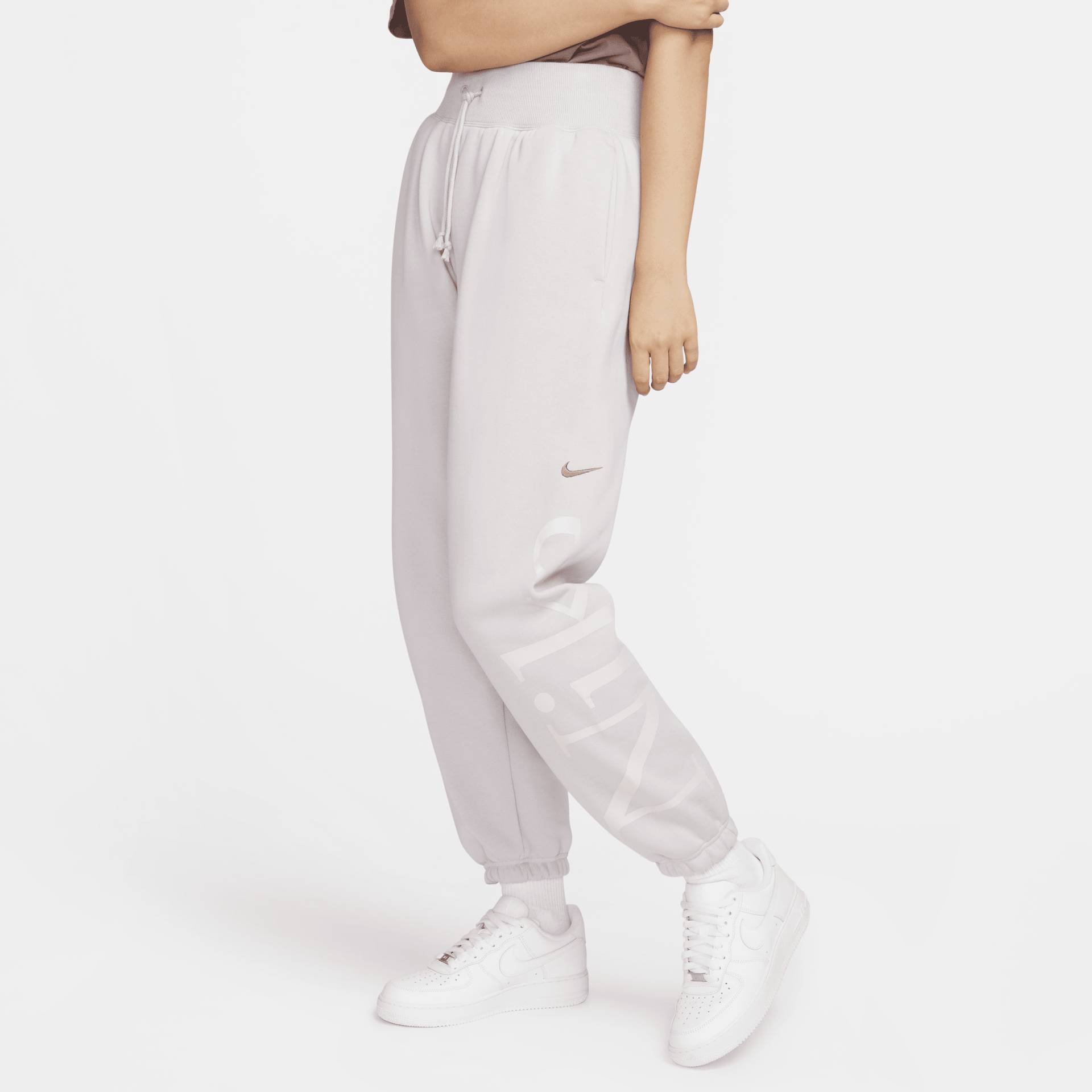 Nike Sportswear Phoenix Oversize-Fleece-Trainingshose mit Logo für Damen - Lila von Nike