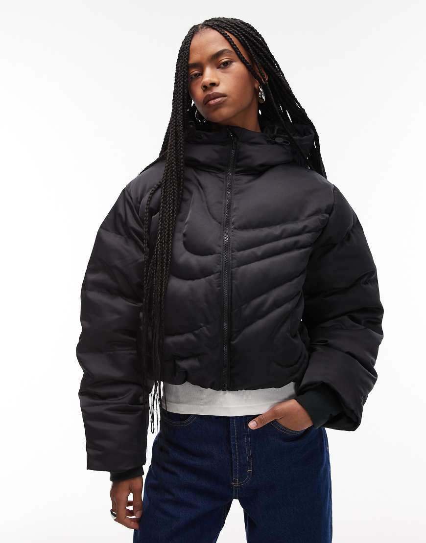 Nike - Steppjacke in Schwarz mit Daunenfüllung und Swoosh-Logo von Nike