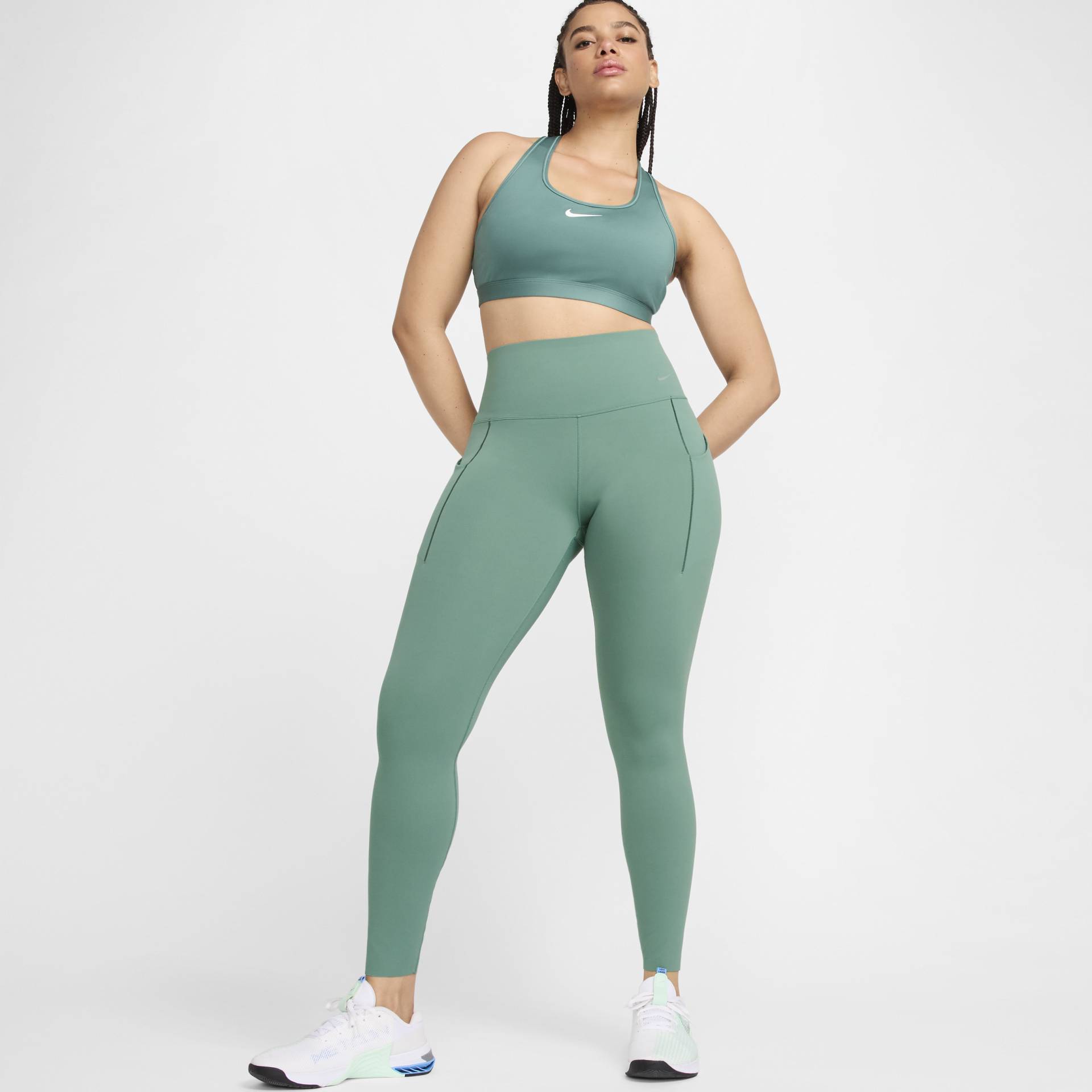 Nike Universa Leggings in voller Länge mit Taschen, mittlerem Halt und hohem Bund für Damen - Grün von Nike