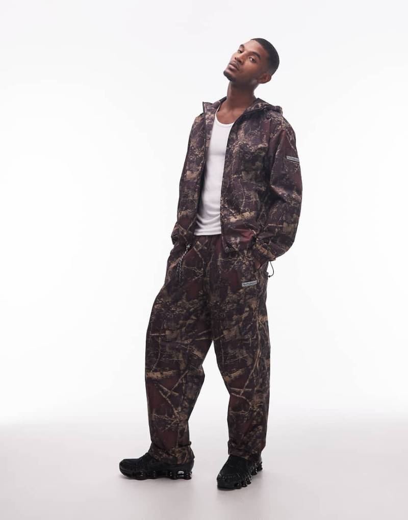 No Problemo - Hose aus Nylon mit dunklem, digital verzerrtem Real Tree-Military-Muster, Kombiteil-Bunt von No Problemo