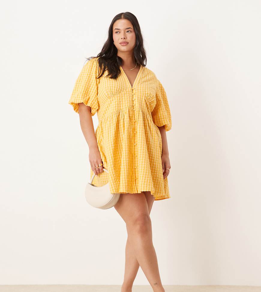 Nobody's Child Plus - Starlight - Minikleid in kariertem Gelb mit Puffärmeln Nobody's Child Plus - Starlight - Minikleid in kariertem Gelb mit Puffärmeln von Nobody's Child Plus