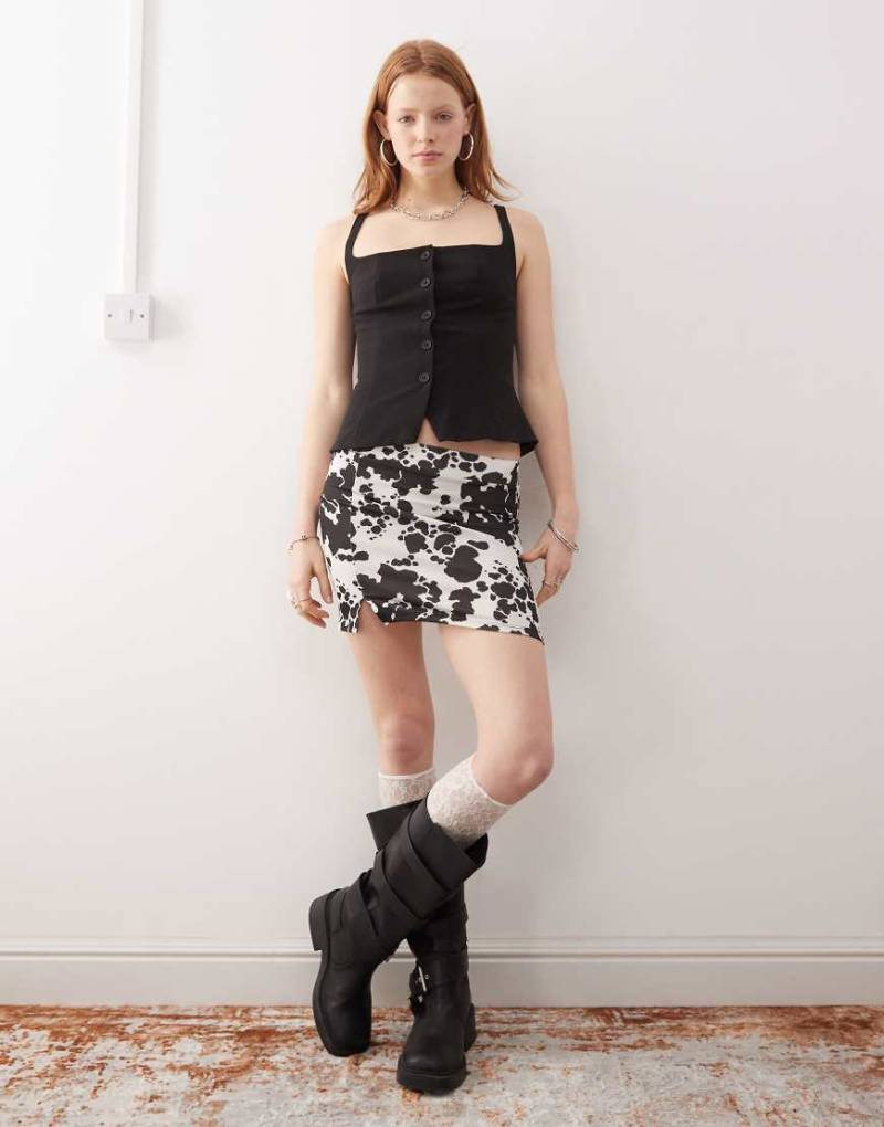 Noisy May - Minirock mit Kuhfleckenmuster-Schwarz von Noisy May