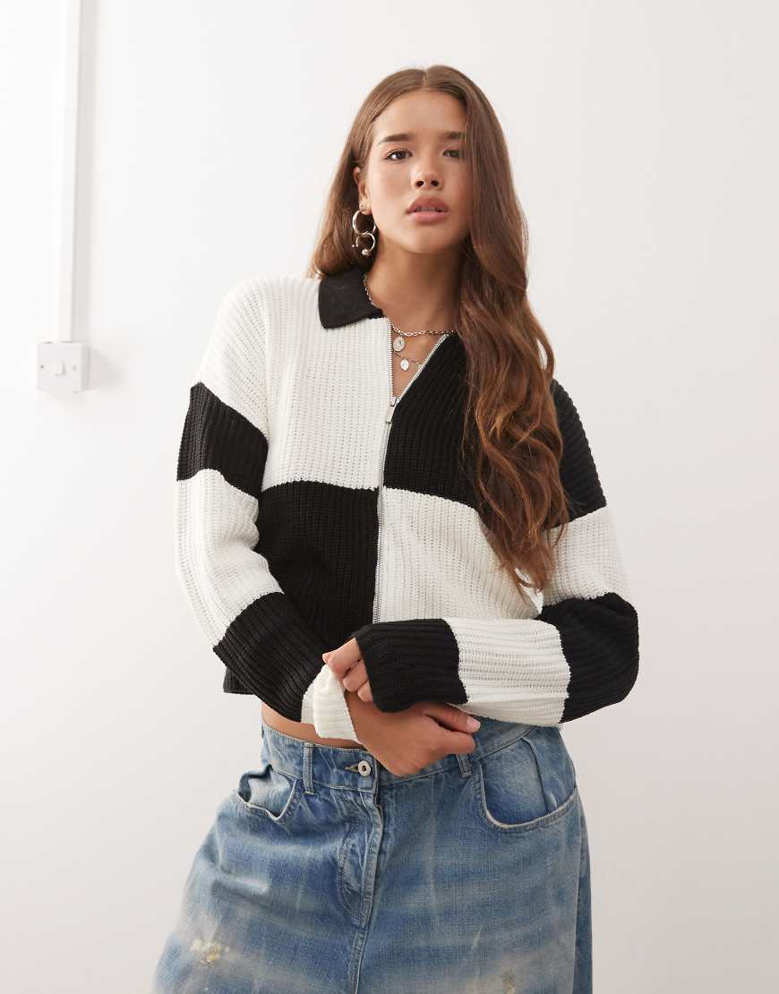 Noisy May - Schwarz-weiß gemusterte Polojacke mit Reißverschluss und Zopfmuster von Noisy May