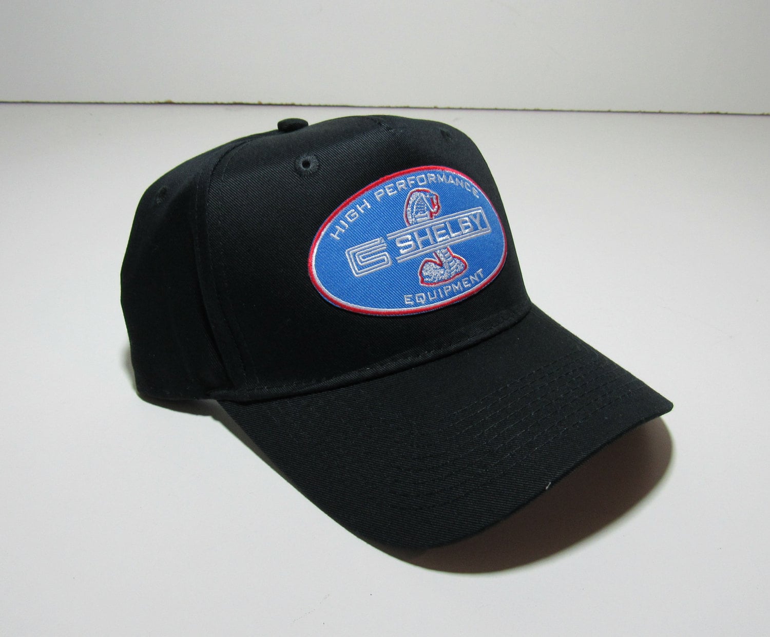 Shelby High Performance Equipment Baseballmütze Cap Racing Ford Oldtimer-Aufnäher Shelby High Performance Equipment Baseballmütze Cap Racing Ford Oldtimer-Aufnäher von NorCalSpeed707
