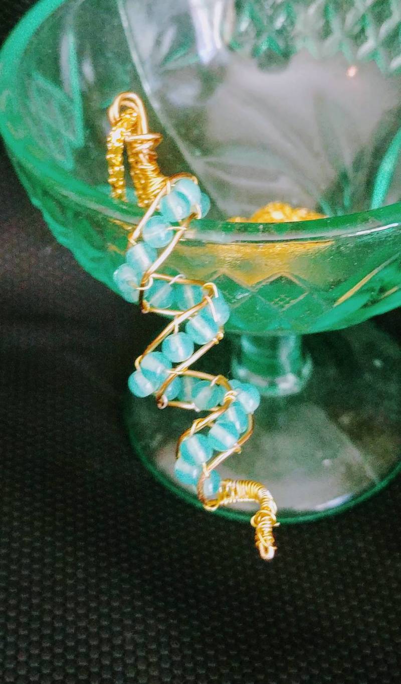 Spiral-Himmel-Uran-Halskette Spiral-Himmel-Uran-Halskette von NorthrnAuroraDesigns