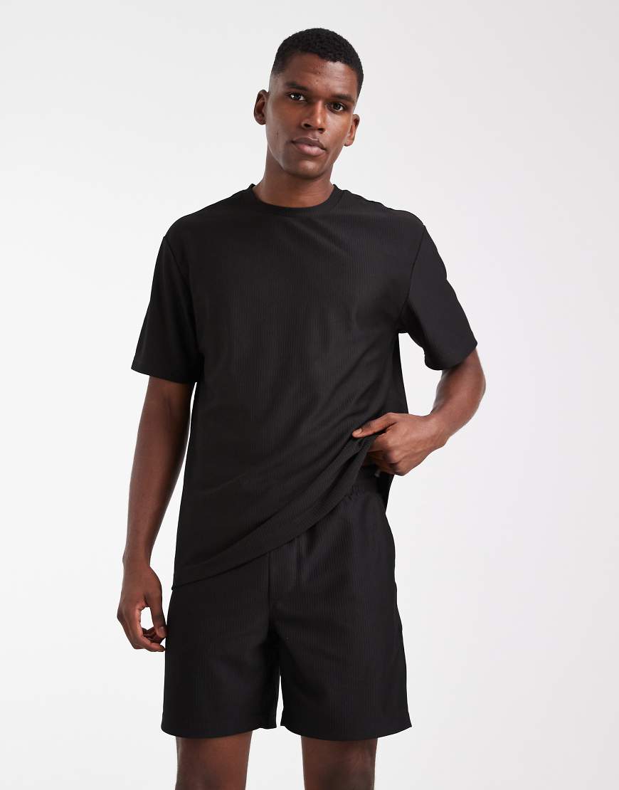 ONLY & SONS - Plissierte Shorts in Schwarz mit elastischem Bund, Kombiteil ONLY & SONS - Plissierte Shorts in Schwarz mit elastischem Bund, Kombiteil von ONLY & SONS