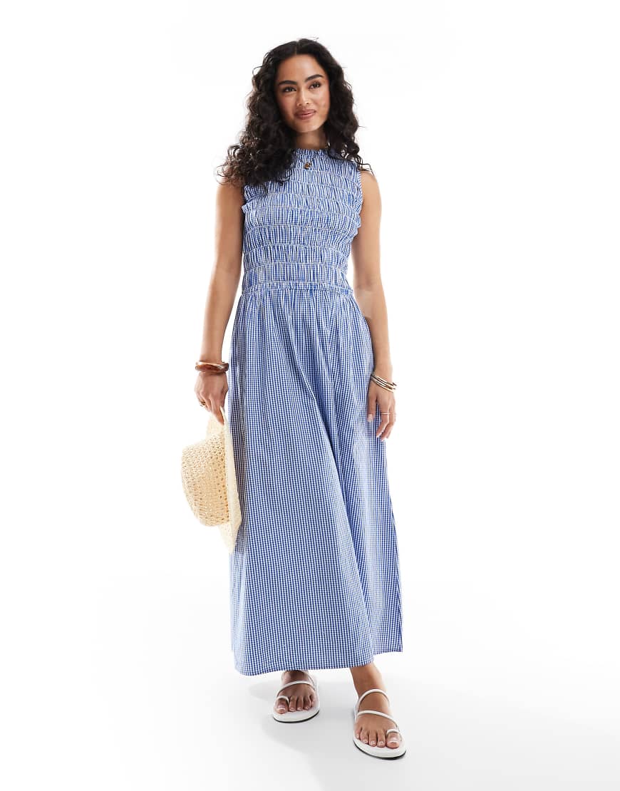 ONLY - Gesmoktes Maxikleid in Hellblau mit tiefer Taille und Vichy-Karos ONLY - Gesmoktes Maxikleid in Hellblau mit tiefer Taille und Vichy-Karos von ONLY